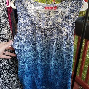 Large Elle brand blue and white tank top.